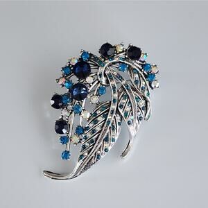 Elegant Silver and Blue Floral Brooch